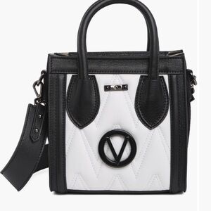 Color blocking, top-handle bag from quilted Italian leather. 8"W x 8"Hx 6"D